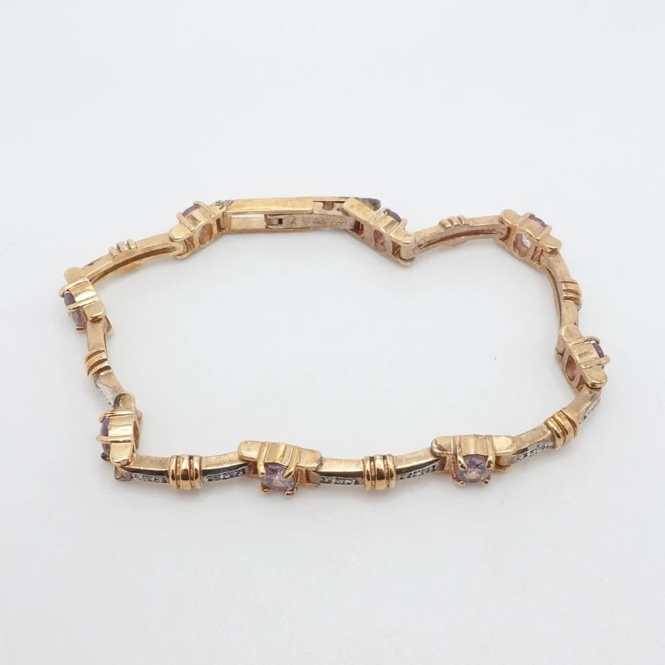 STERLING SILVER YELLOW GOLD PLATED OVAL IOLITE & DIAMOND TENNIS BRACELET 8" LONG: STERLING SILVER YELLOW GOLD PLATED OVAL IOLITE & DIAMOND TENNIS BRACELET 8" LONG Sterling Silver Yellow Gold Plated Oval Iolite & Diamond Tennis Bracelet Length - 8" Long Wrist Size - 7.25" and 7.5" C