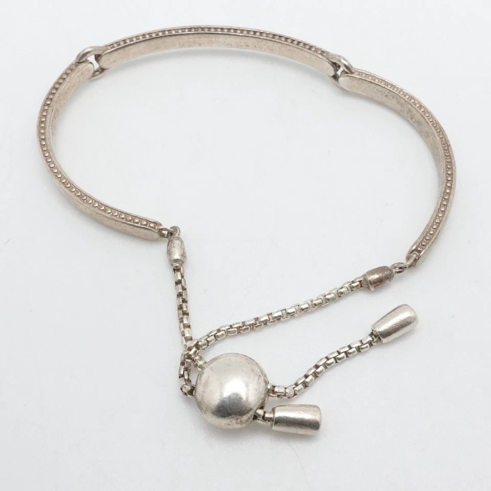 LINKS OF LONDON STERLING SILVER NARRATIVE TOGGLE ADJUSTABLE BRACELET: LINKS OF LONDON STERLING SILVER NARRATIVE TOGGLE ADJUSTABLE BRACELET Links of London Sterling Silver Narrative Toggle Adjustable Bracelet Fits up to Min 6.25" & up Chain Width - 4.5mm & 7mm Depth - 2.