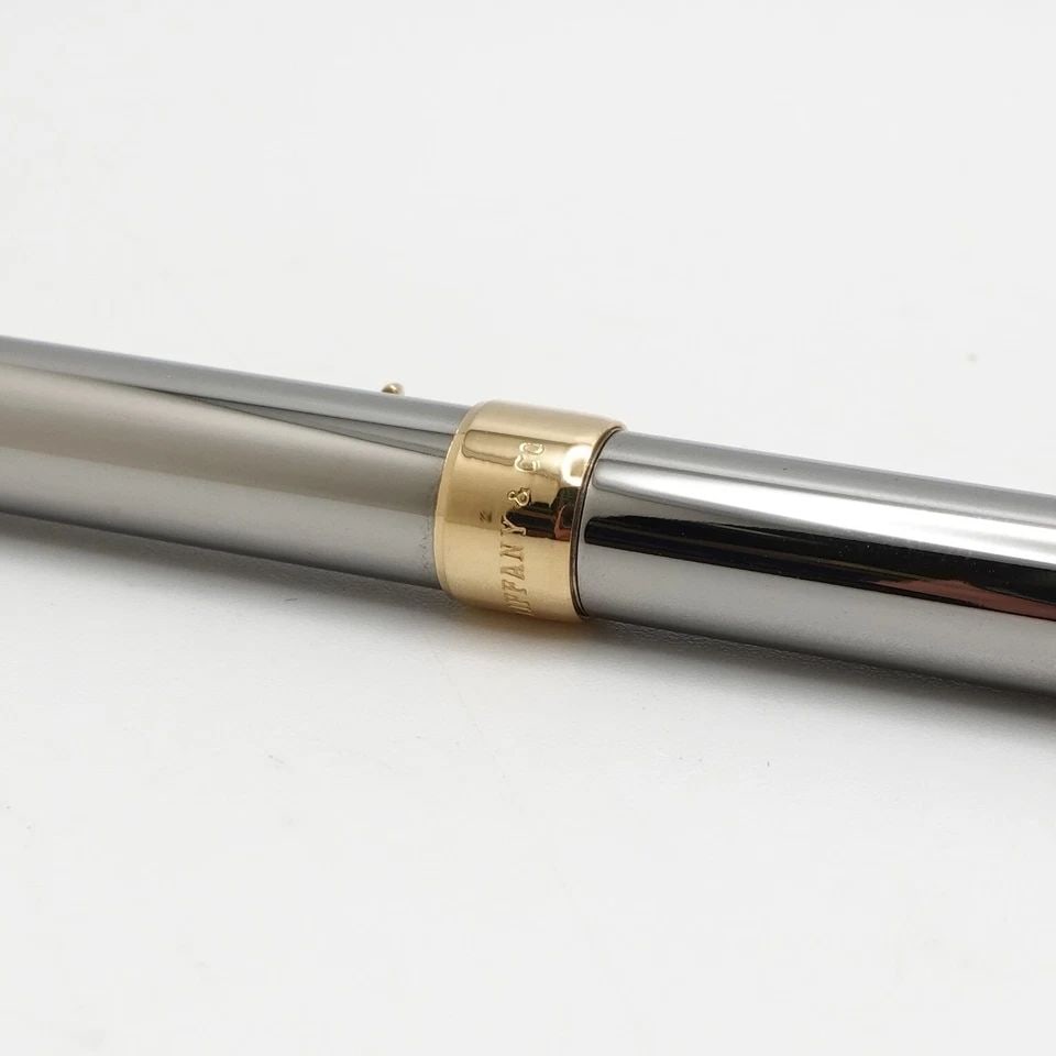 TIFFANY & CO. TWO TONE T-CLIP BALLPOINT PEN - 5": Tiffany & Co. Two Tone T-Clip Ballpoint Pen An ink refill is needed Pouch or Box Not Included