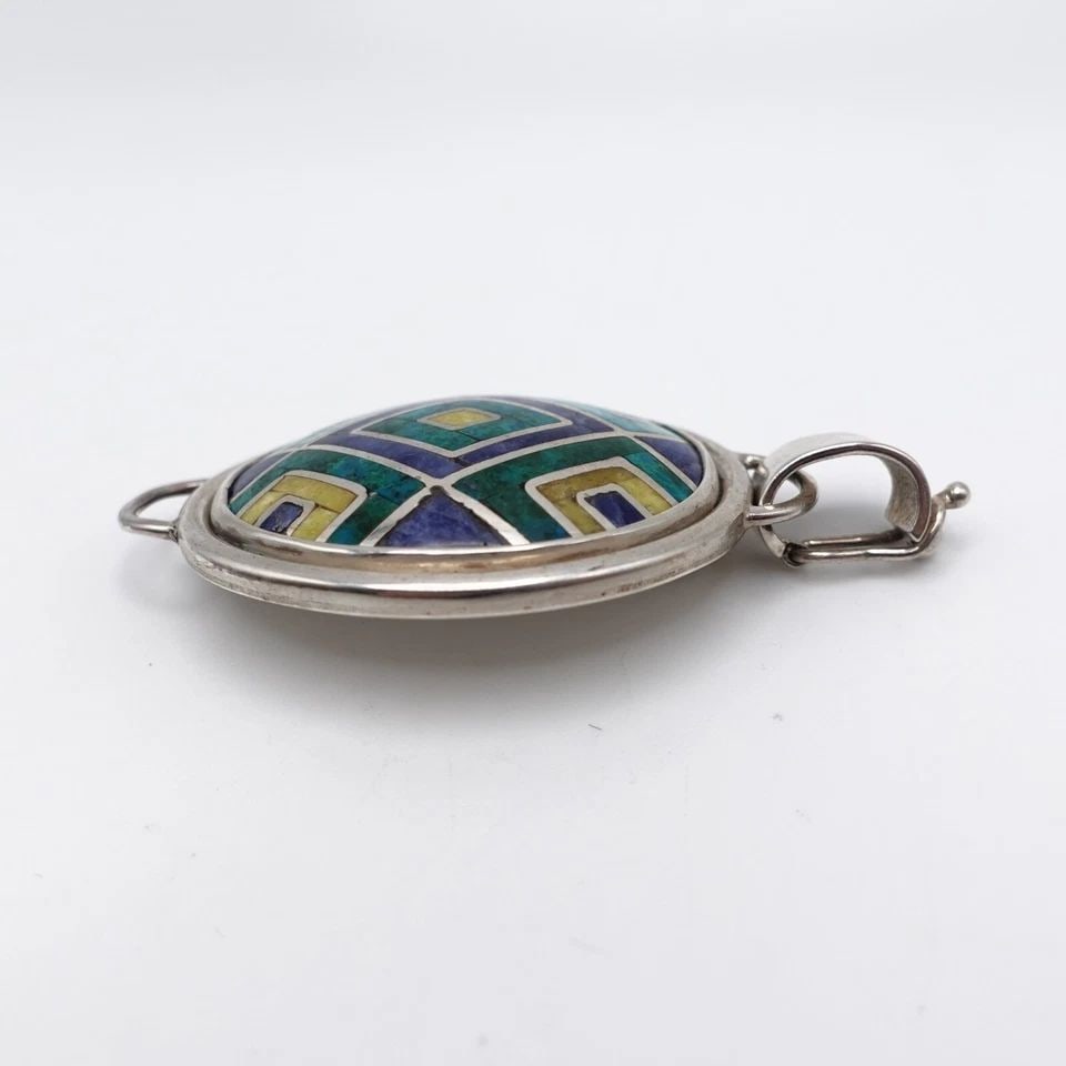 SILVER 950 PERU MULTI GEMSTONE INLAY OVAL PIN BROOCH PENDANT - 2": SILVER 950 PERU MULTI GEMSTONE INLAY OVAL PIN BROOCH PENDANT - 2" Silver 950 Peru Multi Gemstone Inlay Oval Pin Brooch Pendant Height - 2" Length - 1.25" Bail Height - 9mm Bail Width - 6mm Total Weigh
