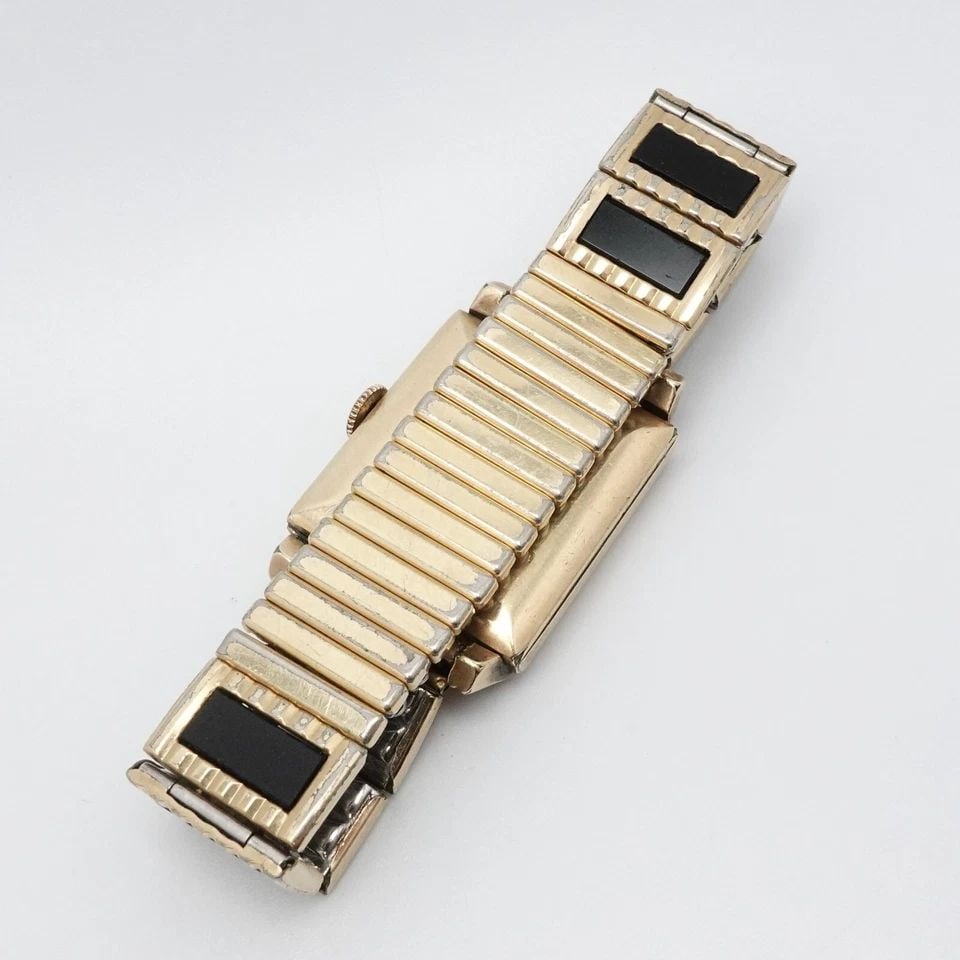 LUCERNE 10K YELLOW GOLD FILLED 17 JEWELS MANUAL WATCH - 24MM X 35MM PARTS REPAIR: Vintage Lucerne 10K Yellow Gold Filled 17 Jewels Antimagnetic Art Deco Style with 1/20 10K Gold Filled Tops Speidel Expandable Bracelet Square Manual Watch Case Size - 24mm x 35mm Fits up to 6.25" Wri