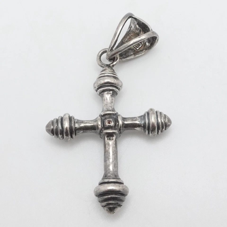 STERLING SILVER ORANGE GARNET CROSS PENDANT 2.5": STERLING SILVER ORANGE GARNET CROSS PENDANT 2.5" Sterling Silver Orange Garnet Cross Pendant Total Length - 2.5" Bail Size (HxW) - 12mm x 8mm Gemstone Size - 4mm Total Weight - 17.5 Grams