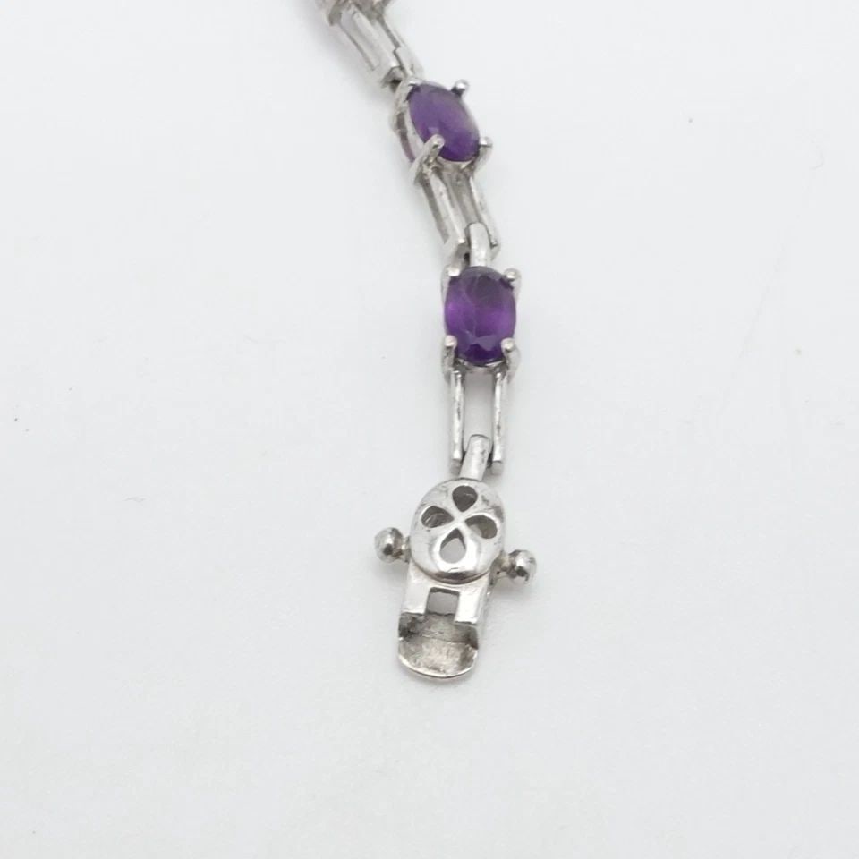 STERLING SILVER OVAL FACETED AMETHYST TENNIS BRACELET 7" LONG (1 of 1)