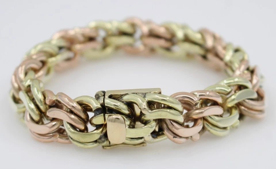 VINTAGE TIFFANY & CO 14K YELLOW & ROSE GOLD 13.5MM BISMARK LINK BRACELET 91G: VINTAGE TIFFANY & CO 14K YELLOW & ROSE GOLD 13.5MM BISMARK LINK BRACELET 91G Description Vintage Tiffany & Co 14K Yellow & Rose Gold 13.5mm Bismark Link Bracelet Bracelet is in good condition. May sho