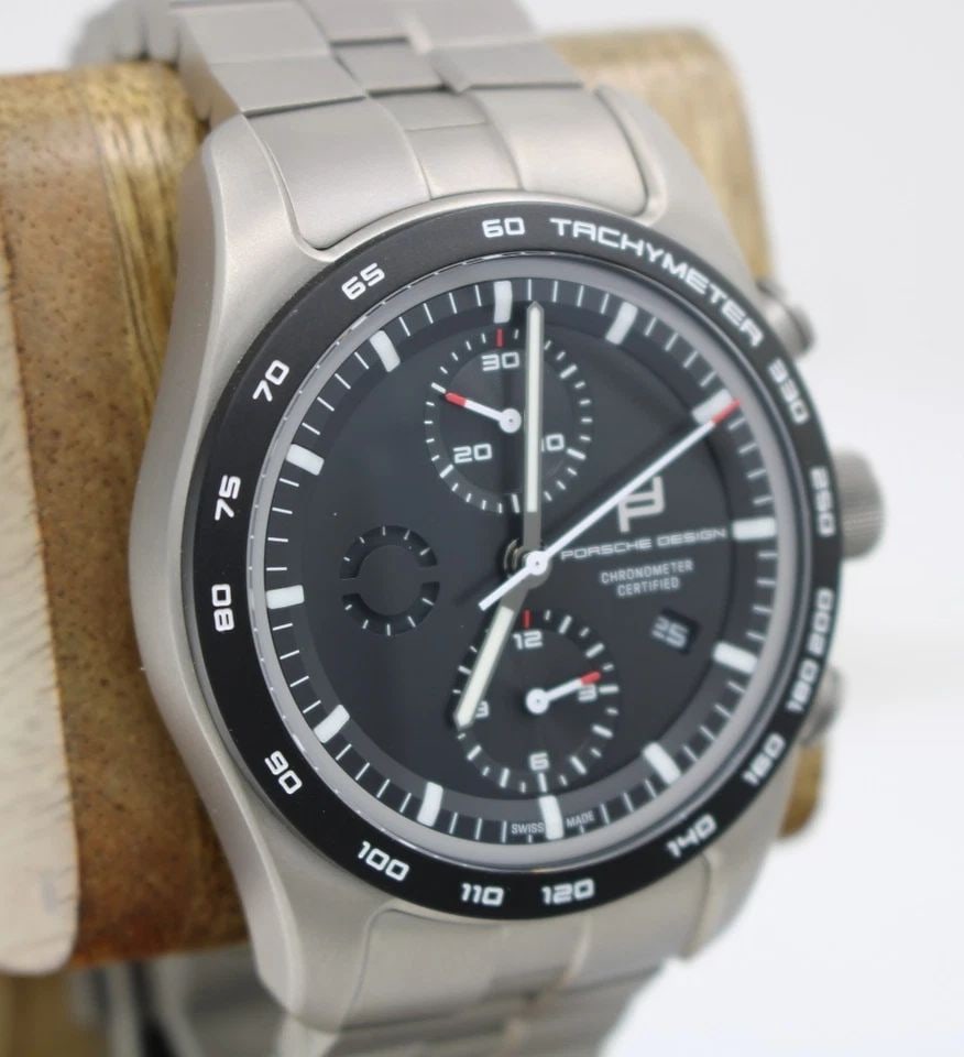 PORSHE DESIGN CUSTOM 42MM BLACK DIAL CHRONO TITANIUM WATCH 6004.0.00.053.00.0: PORSHE DESIGN CUSTOM 42MM BLACK DIAL CHRONO TITANIUM WATCH 6004.0.00.053.00.0 Description Porshe Design Custom 41mm Black Date Dial Chrono Titanium Watch W/ Box 6004.0.00.053.00.0 The watch has been u