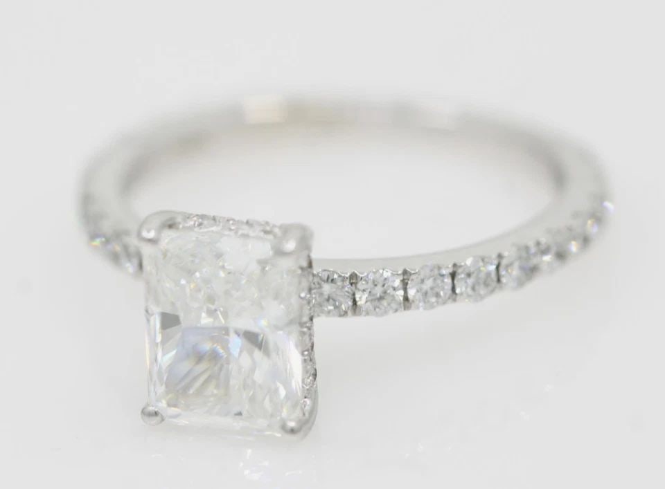 14K WHITE GOLD 2.15 TCW NATURAL DIAMOND RADIANT ENGAGEMENT RING SIZE 6: 14K WHITE GOLD 2.15 TCW NATURAL DIAMOND RADIANT ENGAGEMENT RING SIZE 6 Description 14K White Gold 2.15 TCW Natural Diamond Radiant Engagement Ring Ring is in good condition. May show signs of wear and