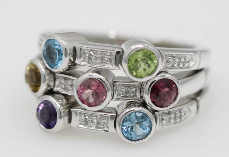 SONIA BITTON GALERIE DE BIJOUX 14K WHITE GOLD MULTI GEMSTONE 3 ROW FLEX RING: SONIA BITTON GALERIE DE BIJOUX 14K WHITE GOLD MULTI GEMSTONE 3 ROW FLEX RING Description Sonia B. Bitton Galerie de Bijoux 14K White Gold Multicolor Gemstone & Diamond 3 Row Flex Ring The ring is in g
