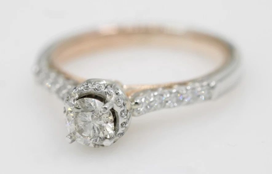 VERRAGIO 14K TWO-TONE WHITE & ROSE GOLD 0.85 TCW NATURAL DIAMOND ENGAGEMENT RING: VERRAGIO 14K TWO-TONE WHITE & ROSE GOLD 0.85 TCW NATURAL DIAMOND ENGAGEMENT RING Description Verragio 14k Two-Tone White & Rose Gold 0.85 TCW Natural Diamond Engagement Ring Style # V-916-RD6-2T/0003 
