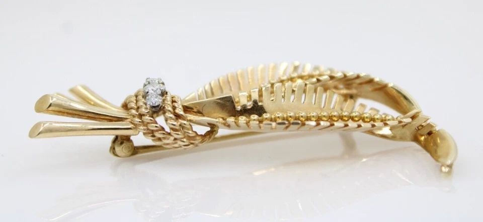 VINTAGE TIFFANY & CO 14K YELLOW GOLD NATURAL DIAMOND BROOCH PIN 8.8 GRAMS: VINTAGE TIFFANY & CO 14K YELLOW GOLD NATURAL DIAMOND BROOCH PIN 8.8 GRAMS VINTAGE TIFFANY & CO 14K YELLOW GOLD NATURAL DIAMOND BROOCH PIN 8.8 GRAMS Description Vintage Tiffany & Co 14k Yellow Gold Nat
