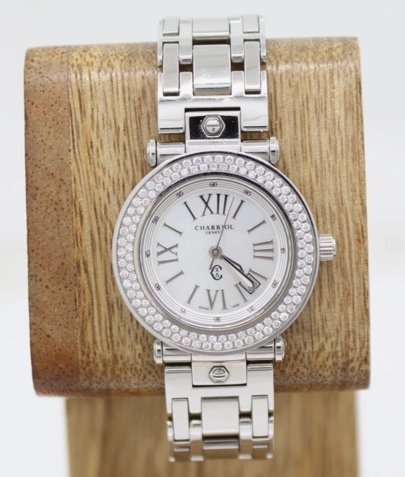 CHARRIOL ROTONDE DIAMOND BEZEL 30MM MOP DATE DIAL QUARTZ WATCH: CHARRIOL ROTONDE DIAMOND BEZEL 30MM MOP DATE DIAL QUARTZ WATCH Description Charriol Rotonde Diamond Bezel 30mm MOP Date Dial Quartz Watch RT30 The watch has been used previously. The watch may have so