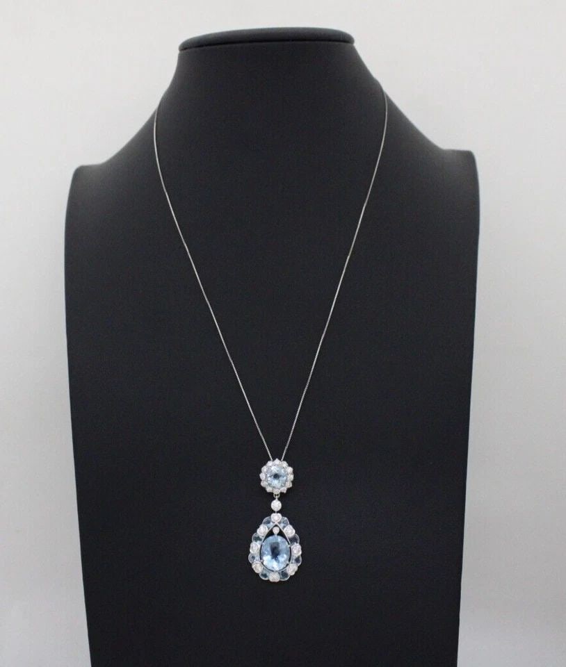 ESTATE 18K WHITE GOLD 4.42 CTW AQUAMARINE & DIAMOND PENDANT W/ 16" NECKLACE: ESTATE 18K WHITE GOLD 4.42 CTW AQUAMARINE & DIAMOND PENDANT W/ 16" NECKLACE ESTATE 18K WHITE GOLD 4.42 CTW AQUAMARINE & DIAMOND PENDANT W/ 16" NECKLACE Description Estate 18K White Gold 4.42 ctw Aquam