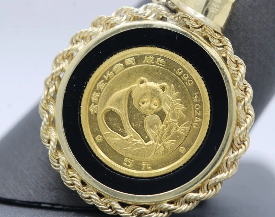 1988 1/20 OZ .999 GOLD CHINESE 5 YUAN PANDA COIN IN 14K YELLOW PENDANT: 1988 1/20 OZ .999 GOLD CHINESE 5 YUAN PANDA COIN IN 14K YELLOW PENDANT 1988 1/20 OZ .999 GOLD CHINESE 5 YUAN PANDA COIN IN 14K YELLOW PENDANT Description 1988 1/20 oz .999 Gold Chinese 5 Yuan Panda Co