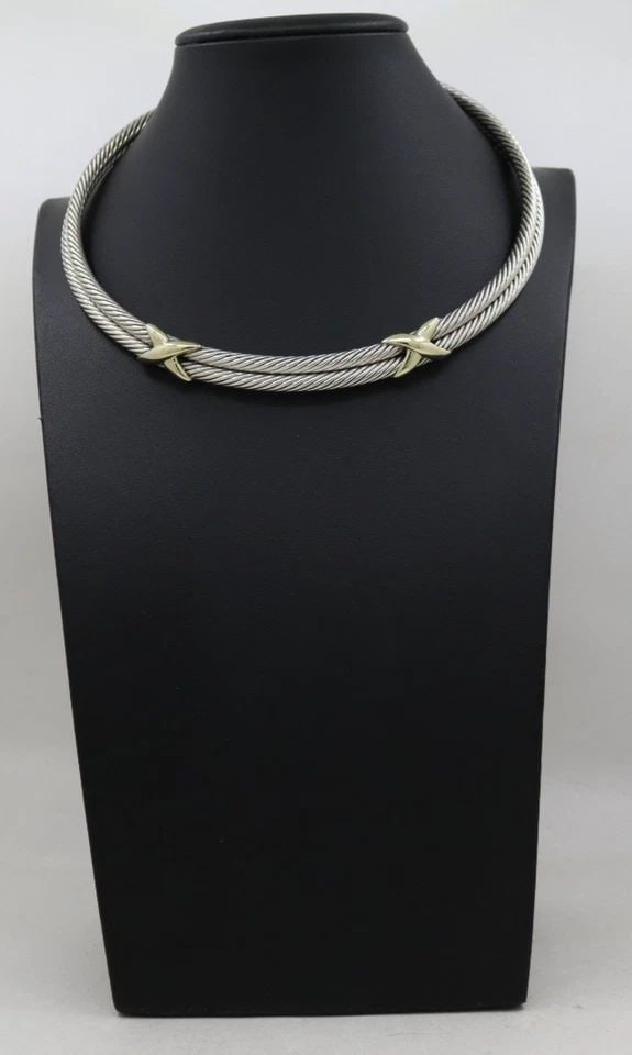 DAVID YURMAN STERLING SILVER & 14K YELLOW GOLD DOUBLE CABLE X CHOKER NECKLACE: DAVID YURMAN STERLING SILVER & 14K YELLOW GOLD DOUBLE CABLE X CHOKER NECKLACE Description David Yurman Sterling Silver & 14K Yellow Gold Double Cable X Choker Necklace Necklace is in good condition. M