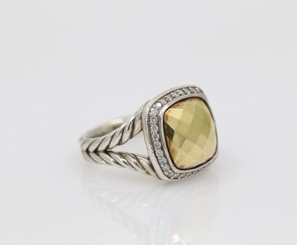 DAVID YURMAN STERLING SILVER & 18K YELLOW GOLD DOMED DIAMOND ALBION RING: DAVID YURMAN STERLING SILVER & 18K YELLOW GOLD DOMED DIAMOND ALBION RING Description David Yurman Sterling Silver & 18k Yellow Gold Domed Diamond Albion Ring Item is in good condition. May show signs 