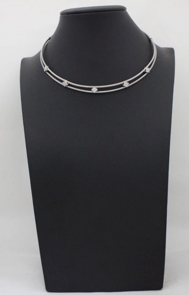 CHARRIOL 18K & STAINLESS STEEL DOUBLE CABLE DIAMOND STATION CHOKER NECKLACE: CHARRIOL 18K & STAINLESS STEEL DOUBLE CABLE DIAMOND STATION CHOKER NECKLACE Description Philippe Charriol 18K White Gold & Stainless Steel Double Cable Kite Set Pave Diamond Station Choker Necklace Ne