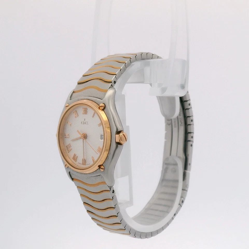 EBEL SPORT CLASSIQUE TWO TONE 18K GOLD 27MM SILVER DIAL DATE WATCH 1087123: EBEL SPORT CLASSIQUE TWO TONE 18K GOLD 27MM SILVER DIAL DATE WATCH 1087123 Description EBEL Sport Classique Two Tone 18K Gold 27mm Silver Dial Date Watch 1087123 The watch has been used previously. Th