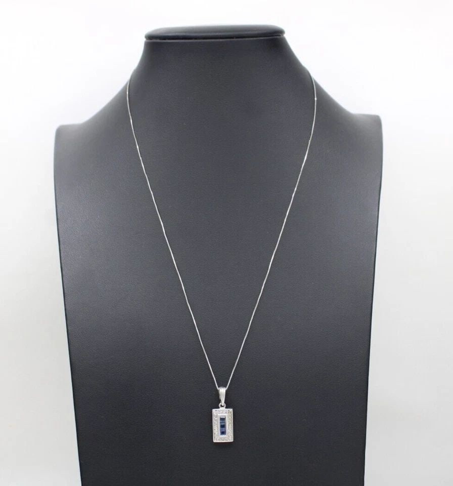 VINTAGE 14K WHITE GOLD NATURAL BLUE SAPPHIRE & DIAMOND PENDANT W/ 18" NECKLACE: VINTAGE 14K WHITE GOLD NATURAL BLUE SAPPHIRE & DIAMOND PENDANT W/ 18" NECKLACE VINTAGE 14K WHITE GOLD NATURAL BLUE SAPPHIRE & DIAMOND PENDANT W/ 18" NECKLACE Description Vintage 14K White Gold Natural