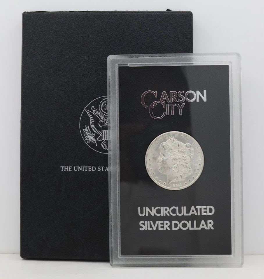 1884-CC CARSON CITY MORGAN SILVER DOLLAR UNCIRCULATED, GSA HOLDER BOX & COA: 1884-CC CARSON CITY MORGAN SILVER DOLLAR UNCIRCULATED, GSA HOLDER BOX & COA Description 1884-CC Carson City Morgan Silver Dollar Uncirculated, GSA Holder Box & COA Coin is in uncirculated condition. E