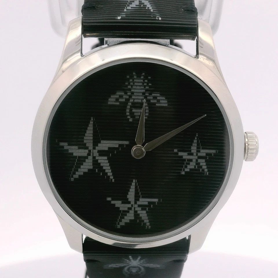 GUCCI G-TIMELESS WOMEN’S BEE AND STAR 38MM BLACK DIAL QUARTZ WATCH YA1264105: GUCCI G-TIMELESS WOMEN’S BEE AND STAR 38MM BLACK DIAL QUARTZ WATCH YA1264105 Description Gucci G-Timeless YA1264105 Women’s Bee and Star 38mm Black Dial Watch The watch has been used previously. T