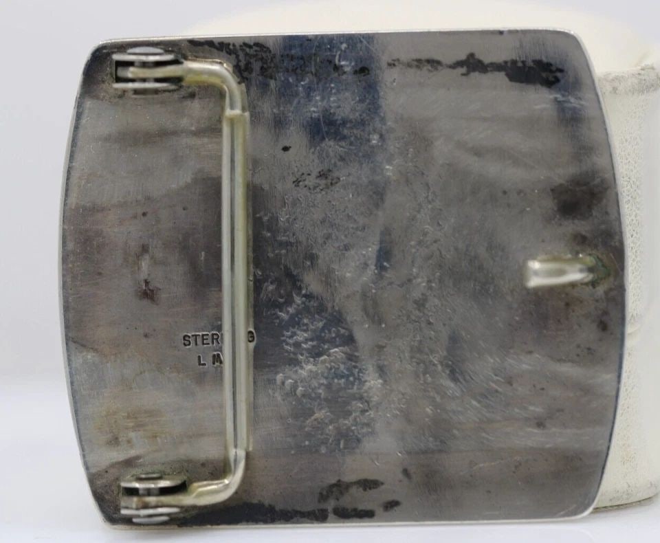 VINTAGE LEONARD MALONEY NAVAJO LM STERLING ETCHED EAGLE 2.25" BUCKLE BELT 42.4G: VINTAGE LEONARD MALONEY NAVAJO LM STERLING ETCHED EAGLE 2.25" BUCKLE BELT 42.4G Description Vintage Leonard Maloney Navajo LM Sterling Silver Etched Eagle 2.25" Buckle Belt Vintage designer Silver bel