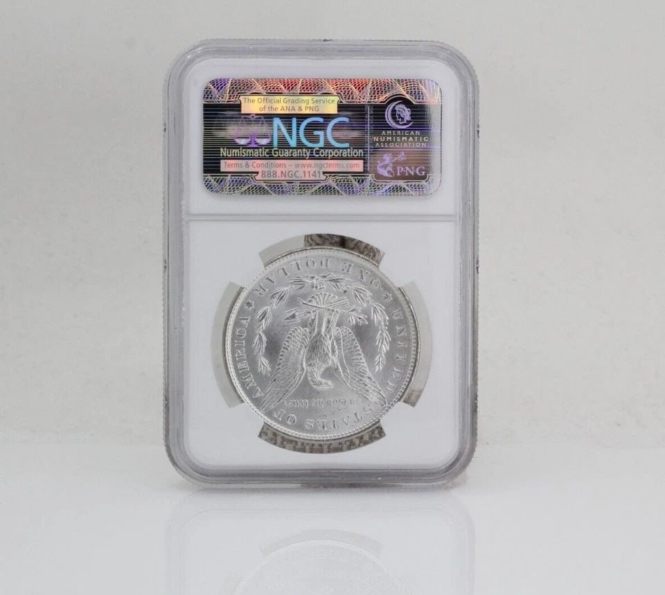 1882 $1 MORGAN SILVER DOLLAR NGC MS 63: 1882 $1 MORGAN SILVER DOLLAR NGC MS 63 1882 $1 MORGAN SILVER DOLLAR NGC MS 63 Description 1882 $1 Morgan Silver Dollar NGC MS 63 Coin is in great condition. Plastic case may show signs of wear and/or 