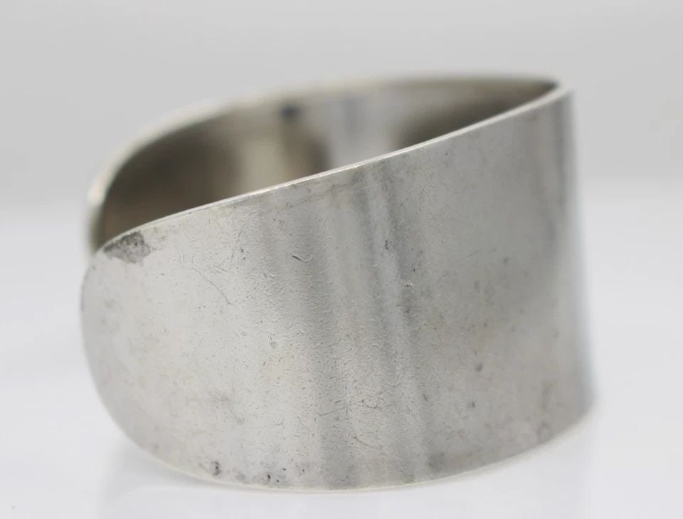 CI STERLING SILVER CUFF BRACELET 7" - 48.2 GRAMS: CI STERLING SILVER CUFF BRACELET 7" - 48.2 GRAMS Description CI Sterling Silver Cuff Bracelet Bracelet is in good condition. May show signs of wear and/or tear. Approximate Measurements Fits up to 7" 