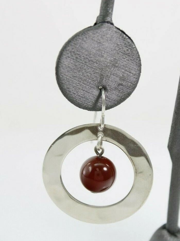 RLM STUDIO STERLING SILVER HAMMERED CIRCLE EARRINGS W/ CARNELIAN BEADS: RLM STUDIO STERLING SILVER HAMMERED CIRCLE EARRINGS W/ CARNELIAN BEADS Description RLM Studio Robert Lee Morris Sterling Silver Hammered Circle Earrings W/Carnelian Beads Item is in great condition. M