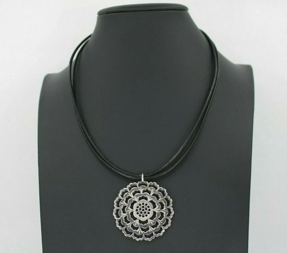 STERLING SILVER FLOWER NECKLACE W/ BLACK LEATHER CORD 18" NECKLACE 23.6 GRAMS: STERLING SILVER FLOWER NECKLACE W/ BLACK LEATHER CORD 18" NECKLACE 23.6 GRAMS Description Sterling Silver Flower Necklace w/ Black Leather Cord 18" Necklace Item is in great condition. May show signs 
