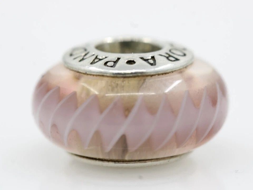 AUTHENTIC PANDORA STERLING SILVER MURANO GLASS PINK ZIG ZAG BEAD CHARM 790620: AUTHENTIC PANDORA STERLING SILVER MURANO GLASS PINK ZIG ZAG BEAD CHARM 790620 Description Authentic Pandora Sterling Silver Murano Glass Pink Zig Zag Bead Charm 790620 Pandora charm is in good conditi