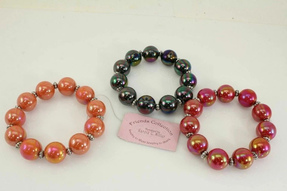 LOT OF 12 COSTUME JEWELRY BEADED BRACELETS BROWN, RED, ORANGE, SILVER, & GREEN (1 of 2)