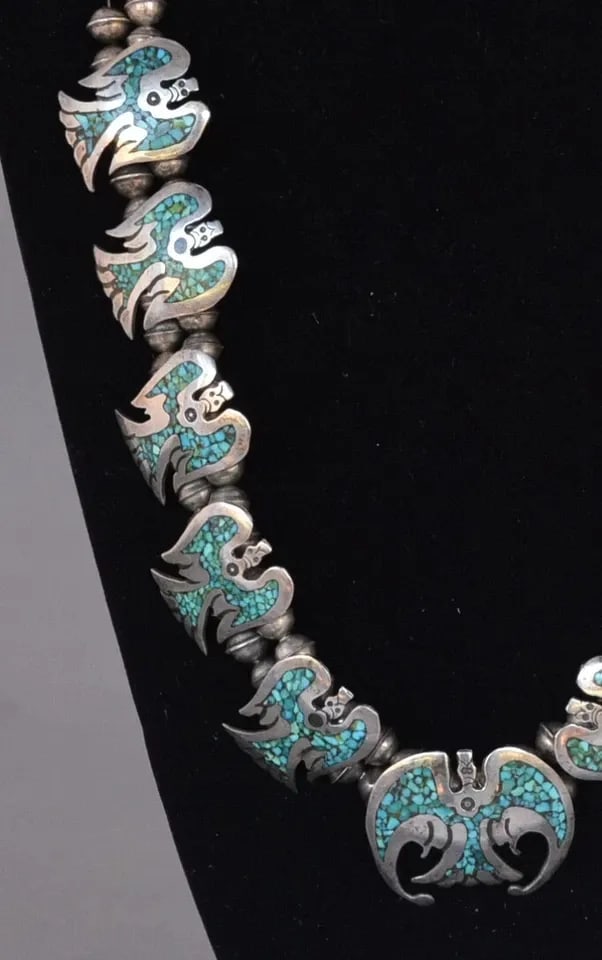 RARE VTG NAVAJO STERLING NECKLACE - TURQUOISE ,CORAL WATER PHOENIX BIRDS - 27.": RARE VTG NAVAJO STERLING NECKLACE - TURQUOISE ,CORAL WATER PHOENIX BIRDS - 27." This rare vintage Navajo Sterling Silver necklace has 11 turquoise coral Water birds (sometimes referred to as Phoenix o