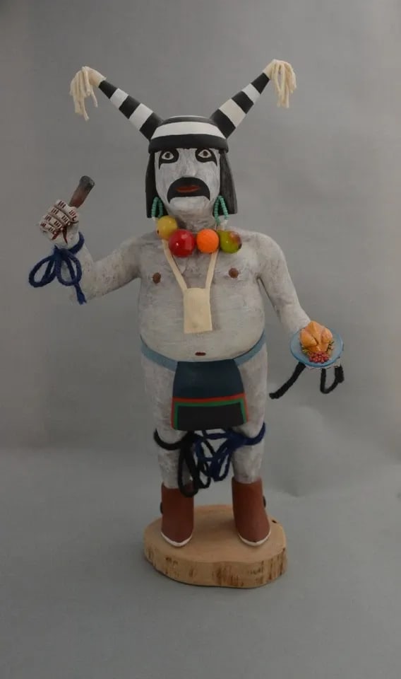 HENRY SHELTON (1929-2016) VINTAGE HOPI KACHINA - KOSHARE "BAD DUDE" - 14.5": HENRY SHELTON (1929-2016) VINTAGE HOPI KACHINA - KOSHARE "BAD DUDE" - 14.5" This wonderful Koshare kachina has been beautifully carved by well known Hopi artist Henry Shelton. It stands 14.5" tall, in