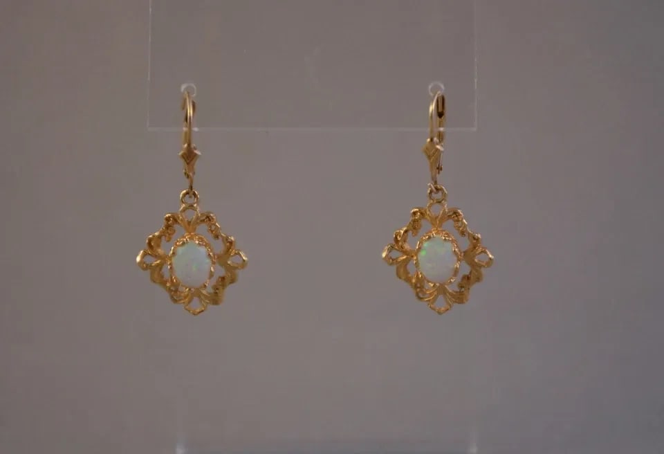 VINTAGE SOLID 14K YELLOW GOLD DANGLE EARRINGS - OPAL - 1 3/8" DROP: VINTAGE SOLID 14K YELLOW GOLD DANGLE EARRINGS - OPAL - 1 3/8" DROP Item Description: This pair of vintage earrings have opals set into beautiful 14K solid gold settings. The earring pendants measure 3