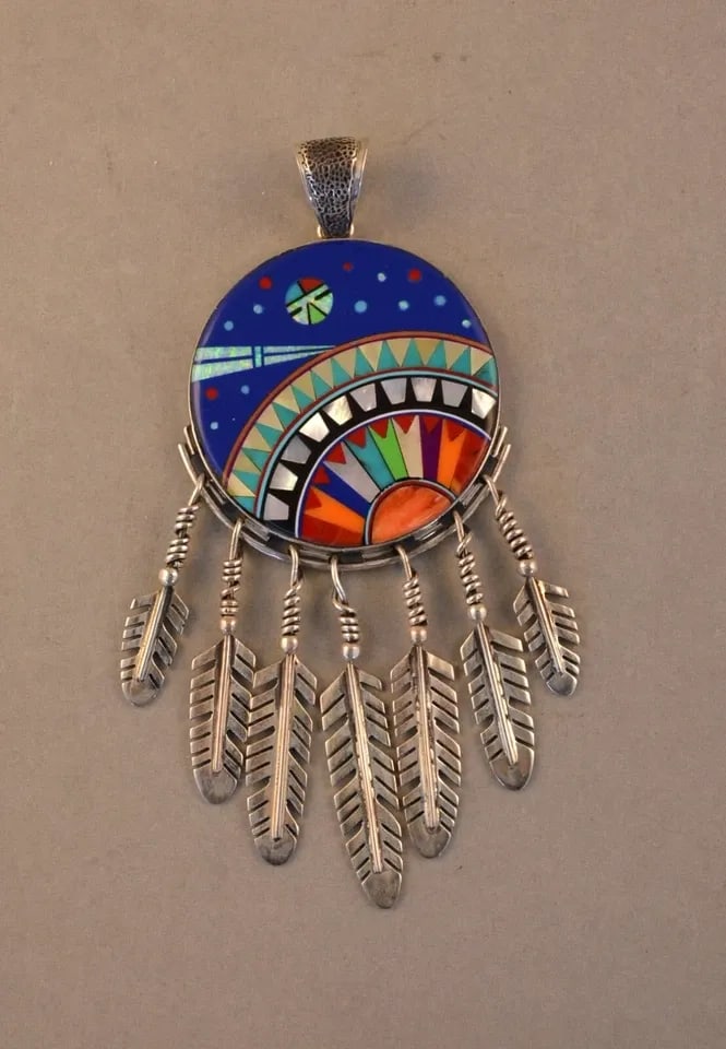 VINTAGE NAVAJO STERLING SILVER PENDANT - SUN STARS MOON - DANGLE FEATHERS - 4.5": VINTAGE NAVAJO STERLING SILVER PENDANT - SUN STARS MOON - DANGLE FEATHERS - 4.5" This extraordinary sterling silver pendant has been designed and crafted by Navajo silversmith James Mason. It has fant