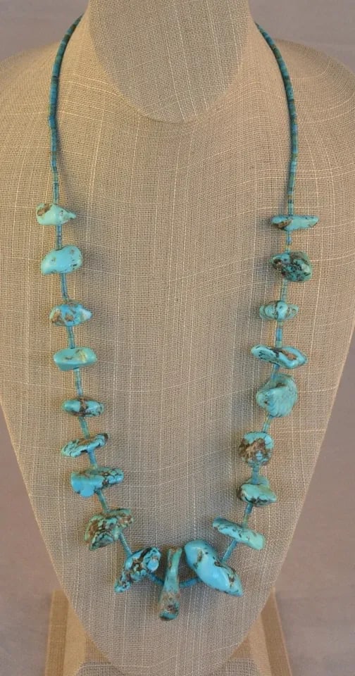 VINTAGE NAVAJO GRADUATED TURQUOISE NUGGET AND HEISHI BEAD NECKLACE - 27 3/4": VINTAGE NAVAJO GRADUATED TURQUOISE NUGGET AND HEISHI BEAD NECKLACE - 27 3/4" This vintage Navajo necklace has graduated turquoise nuggets alternating with fine turquoise heishi. The necklace is 27 3/4