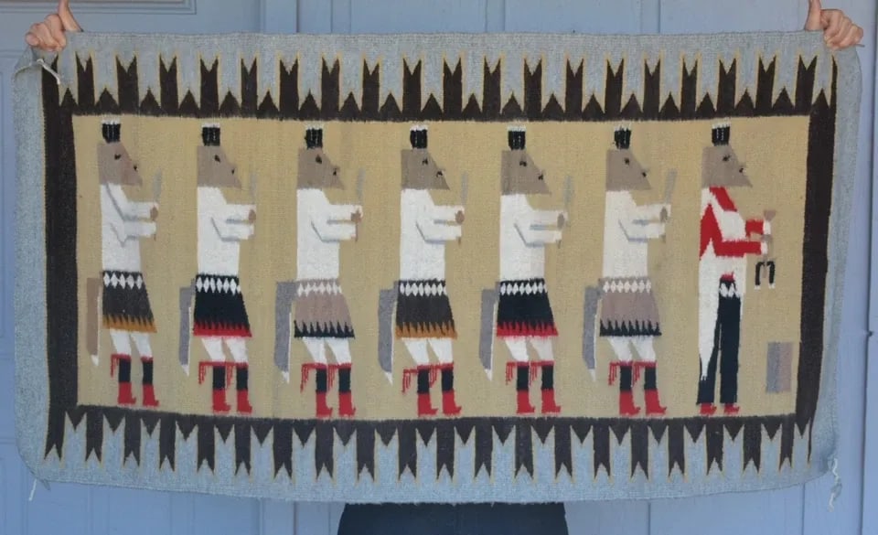 VINTAGE NAVAJO PICTORIAL YEI BI CHEI RUG - 7 FOX DANCERS - - 54.5" X 29.5": VINTAGE NAVAJO PICTORIAL YEI BI CHEI RUG - 7 FOX DANCERS - - 54.5" X 29.5" This vintage Navajo pictorial rug shows 7 Yei figures. It has been nicely woven and is in very good vintage condition. It mea