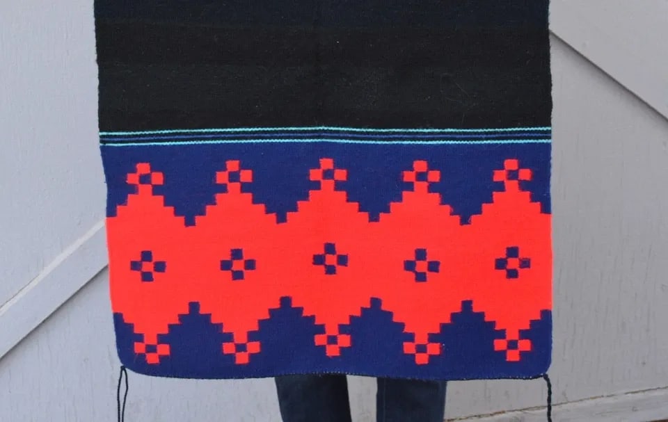 NAVAJO RUG - DRESS PANEL - DIAMOND CROSS PATTERN - 44" X 25": NAVAJO RUG - DRESS PANEL - DIAMOND CROSS PATTERN - 44" X 25" This Navajo rug / dress panel has been beautifully and tightly woven. The colors are dark blue, black, and red with a turquoise stripe. Thi