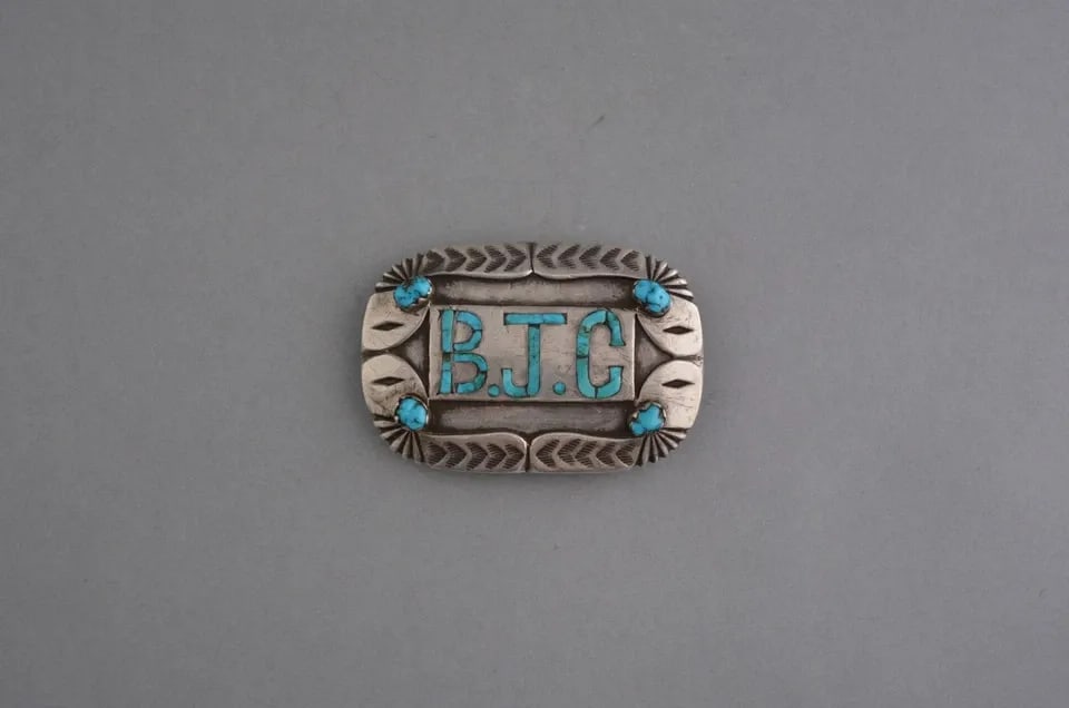 OLD PAWN NAVAJO STERLING SILVER HANDSTAMPED BUCKLE - TURQUOISE INLAY - 3" X 2": OLD PAWN NAVAJO STERLING SILVER HANDSTAMPED BUCKLE - TURQUOISE INLAY - 3" X 2" This old pawn Navajo sterling silver buckle shows some nice old silverwork. It measures 3" x 2". The edges are silver on 