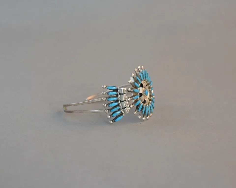 DAN ETSATE - ZUNI SILVER PETTIPOINT KINGMAN TURQUOISE CLUSTER BRACELET SZ 6 3/8: DAN ETSATE - ZUNI SILVER PETTIPOINT KINGMAN TURQUOISE CLUSTER BRACELET SZ 6 3/8 This lovely turquoise pettipoint cluster bracelet has been beautifully crafted by Zuni silversmith Dan Etsate. The turqu