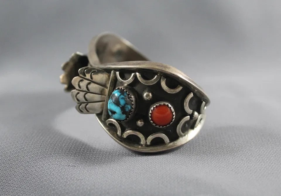 OLD PAWN NAVAJO TURQUOISE AND CORAL WATCH BRACELET: OLD PAWN NAVAJO TURQUOISE AND CORAL WATCH BRACELET Item Description: Widest Point 1 1/8 " ..4 7/8 " Inside with a 1" opening .. Nice Stones.. 1 .6 Oz..