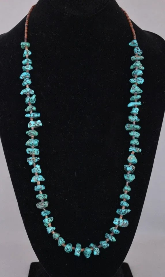OLD PAWN NAVAJO BEAD NECKLACE - TURQUOISE NUGGETS AND FINE HEISHI - 29.5" LONG: OLD PAWN NAVAJO BEAD NECKLACE - TURQUOISE NUGGETS AND FINE HEISHI - 29.5" LONG This vintage Navajo necklace has turquoise nuggets alternating with fine olive shell heishi. It is 29.5" long. It is in g