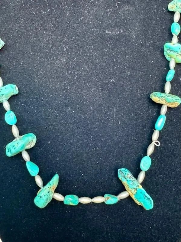 OLD PAWN NAVAJO TURQUOISE AND STERLING SILVER NECKLACE 28: OLD PAWN NAVAJO TURQUOISE AND STERLING SILVER NECKLACE 28” Old Pawn Navajo Turquoise and Sterling Silver Necklace 28”. Turquoise nuggets 1/4-1” size. on old cotton string ..Looks lik
