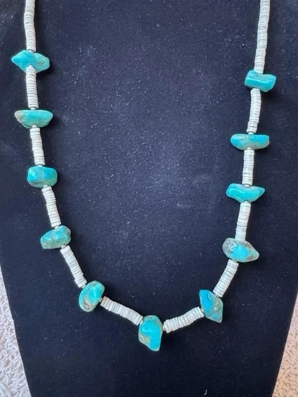 OLD PAWN NAVAJO TURQUOISE AND SHELL NECKLACE WITH SILVER BEADS 24.5: OLD PAWN NAVAJO TURQUOISE AND SHELL NECKLACE WITH SILVER BEADS 24.5” Old Pawn Navajo Turquoise and Shell Necklace with Silver Beads 24.5”. Turquoise nuggets 1/2”.