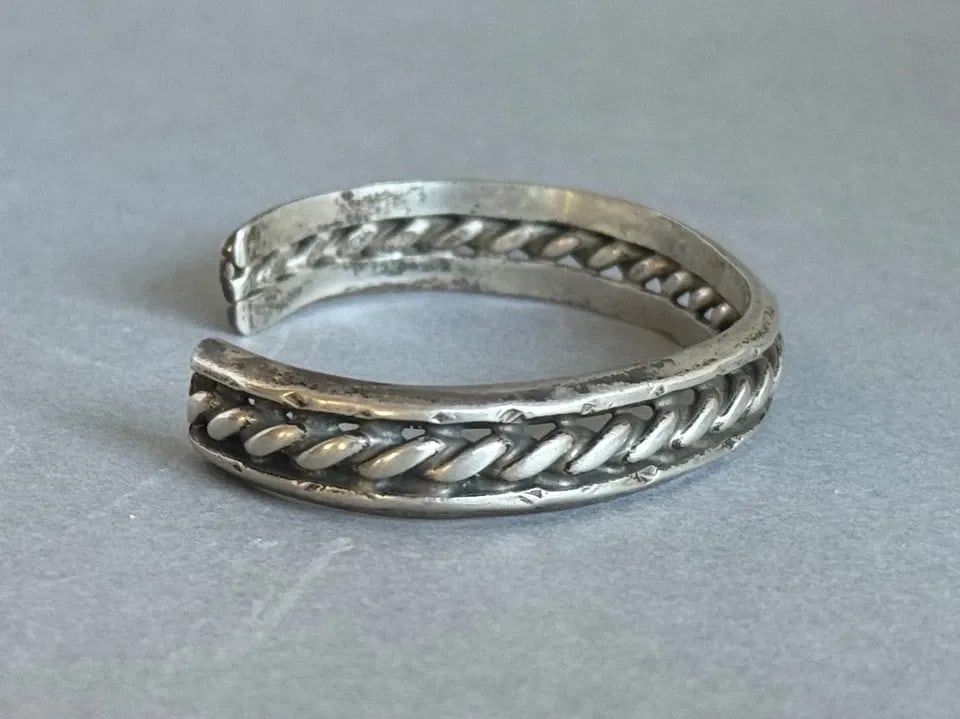 OLD PAWN NAVAJO STERLING SILVER BRACELET: OLD PAWN NAVAJO STERLING SILVER BRACELET Old Pawn Navajo Sterling Silver Bracelet 3/8" Tall ..5" Inside with a 1 1/4" Opening ..30 Grams