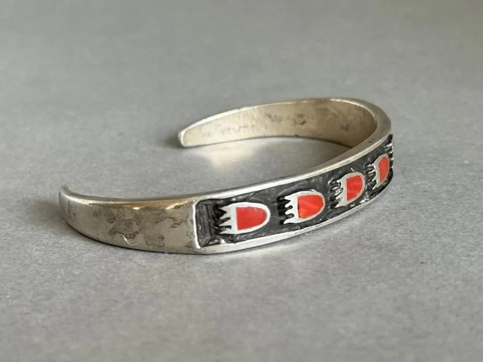 VINTAGE NAVAJO STERLING SILVER WITH INLAID CORAL BEAR PAW BRACELET: VINTAGE NAVAJO STERLING SILVER WITH INLAID CORAL BEAR PAW BRACELET Vintage Navajo Sterling Silver with Inlaid Coral Bear Paw Bracelet 3/8" wide 5" Inside with a 1 1/4" Opening