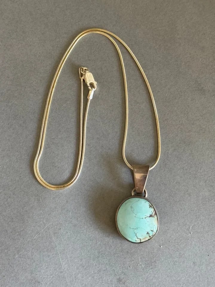UNUSED NAVAJO STERLING SILVER AND DRY CREEK TURQUOISE PENDANT ON STERLING CHAIN: UNUSED NAVAJO STERLING SILVER AND DRY CREEK TURQUOISE PENDANT ON STERLING CHAIN Unused Navajo Sterling Silver and Dry Creek Turquoise Pendant on Sterling Silver Chain ..pendant 1 3/8" tall ..17" Sterl