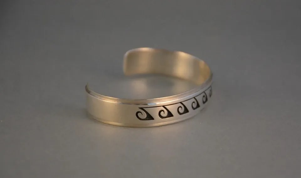 AUGUSTINE MOWA - HOPI INDIAN STERLNG SILVER BRACELET - WHIRLWIND RAIN - 7 3/8": AUGUSTINE MOWA - HOPI INDIAN STERLNG SILVER BRACELET - WHIRLWIND RAIN - 7 3/8" Item Description: This bracelet has been beautifully crafted by Hopi artist Augustine Mowa. It shows a wonderful design o