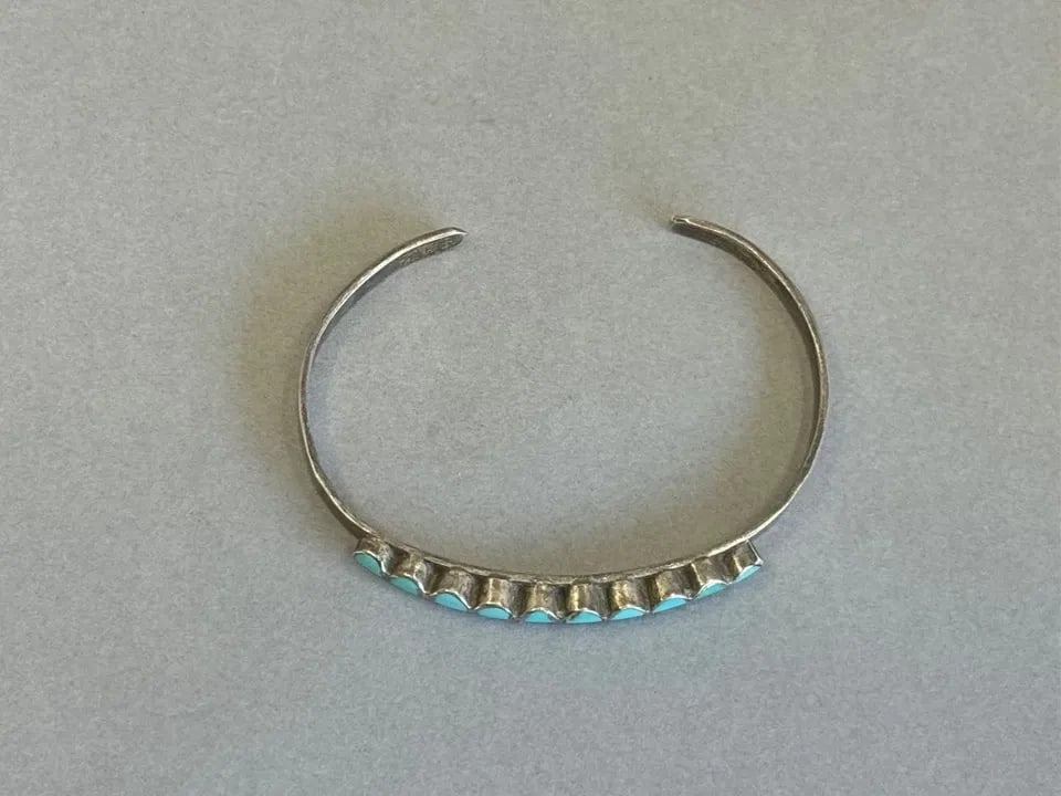 OLD PAWN NAVAJO STERLING SILVER AND TURQUOISE BRACELET. 6 1/4" AROUND: OLD PAWN NAVAJO STERLING SILVER AND TURQUOISE BRACELET. 6 1/4" AROUND Old Pawn Zuni Sterling Silver and Turquoise Bracelet 5 1/8" Inside Around with 1 1/8 " Opening