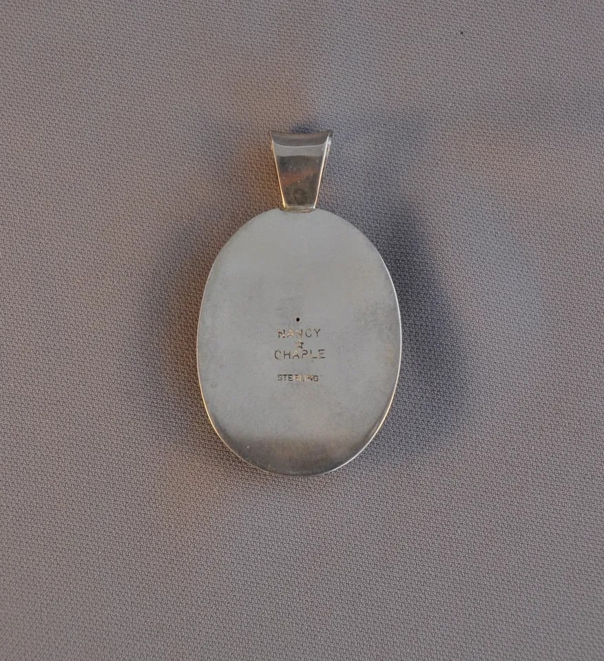 VINTAGE NAVAJO STERLING SILVER PENDANT - BEAUTIFUL TIGERS EYE STONE - 2 3/4": VINTAGE NAVAJO STERLING SILVER PENDANT - BEAUTIFUL TIGERS EYE STONE - 2 3/4" Item Description: This large sterling silver pendant is set with a beautiful Tiger's Eye stone. The pendant, including the 