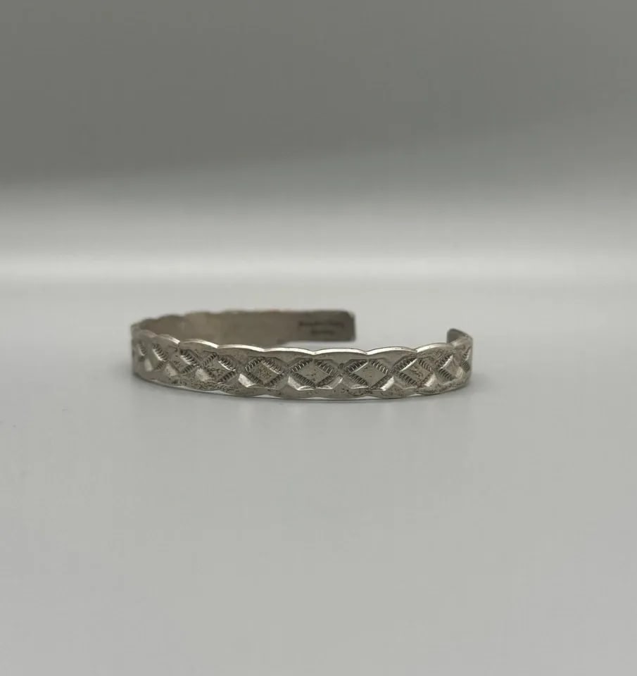 VINTAGE NAVAJO STERLING SILVER BRACELET SIGNED DOUGLAS CTAITTY?: VINTAGE NAVAJO STERLING SILVER BRACELET SIGNED DOUGLAS CTAITTY? Item Description: 3/8 " Wide ..5 7/8 " Inside with a 1 1/8 " Opening P